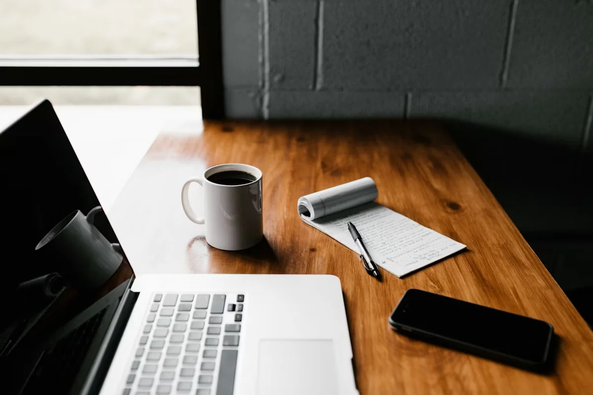 Laptop with spreadsheet open for citation audit tracking