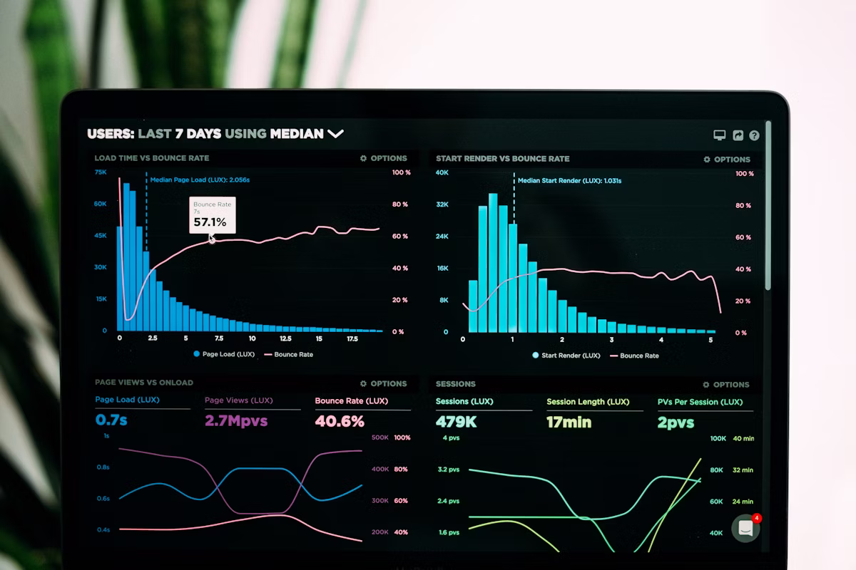 Laptop screen showing Google PageSpeed Insights with Core Web Vitals metrics